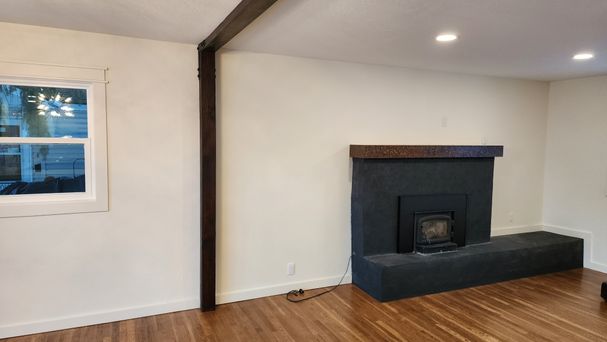 Freshly painted interior with smooth drywall finish and accent wall by Hutch Construction in Bozeman