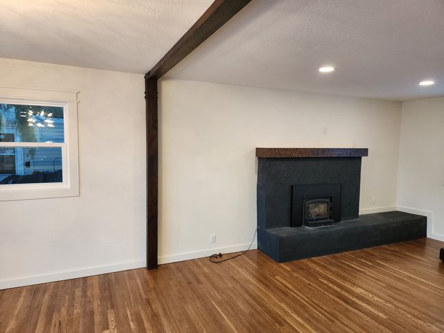 Freshly painted interior with smooth drywall finish and accent wall by Hutch Construction in Bozeman